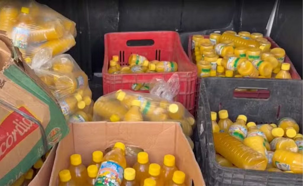 Mais de 500 embalagens de manteiga da terra falsificadas foram apreendidas — Foto: Reprodução/TV Cabo Branco